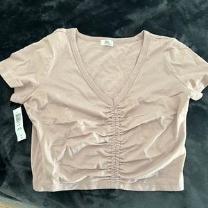 Aritzia crop top.  Colour fawn pink